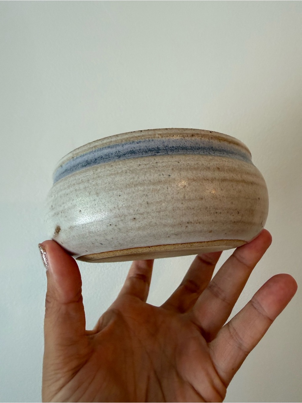 Handcrafted Ceramic Bowl in Cream with Blue Accent